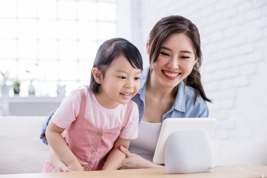 Child Speaking to Smart AI Computer